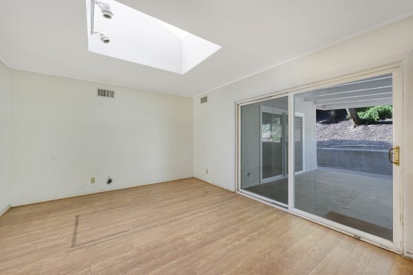 1337 Sheppard Drive, Fullerton, CA 92831 room with skylight and sliding glass doors