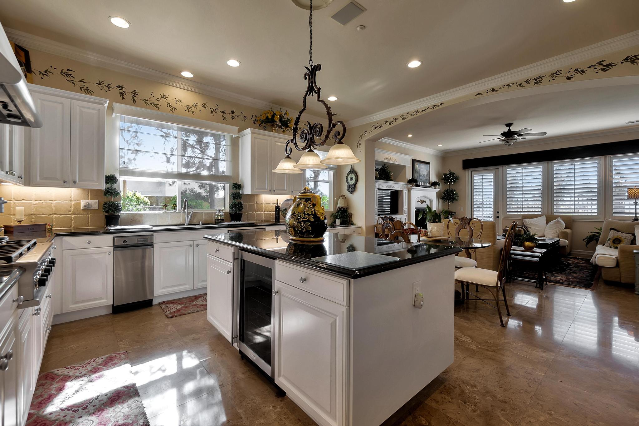 Tuscan-Inspired Olinda Ranch Villa – 467 Tangerine Place, Brea, CA 92823 - Kitchen Angled View with Living Room