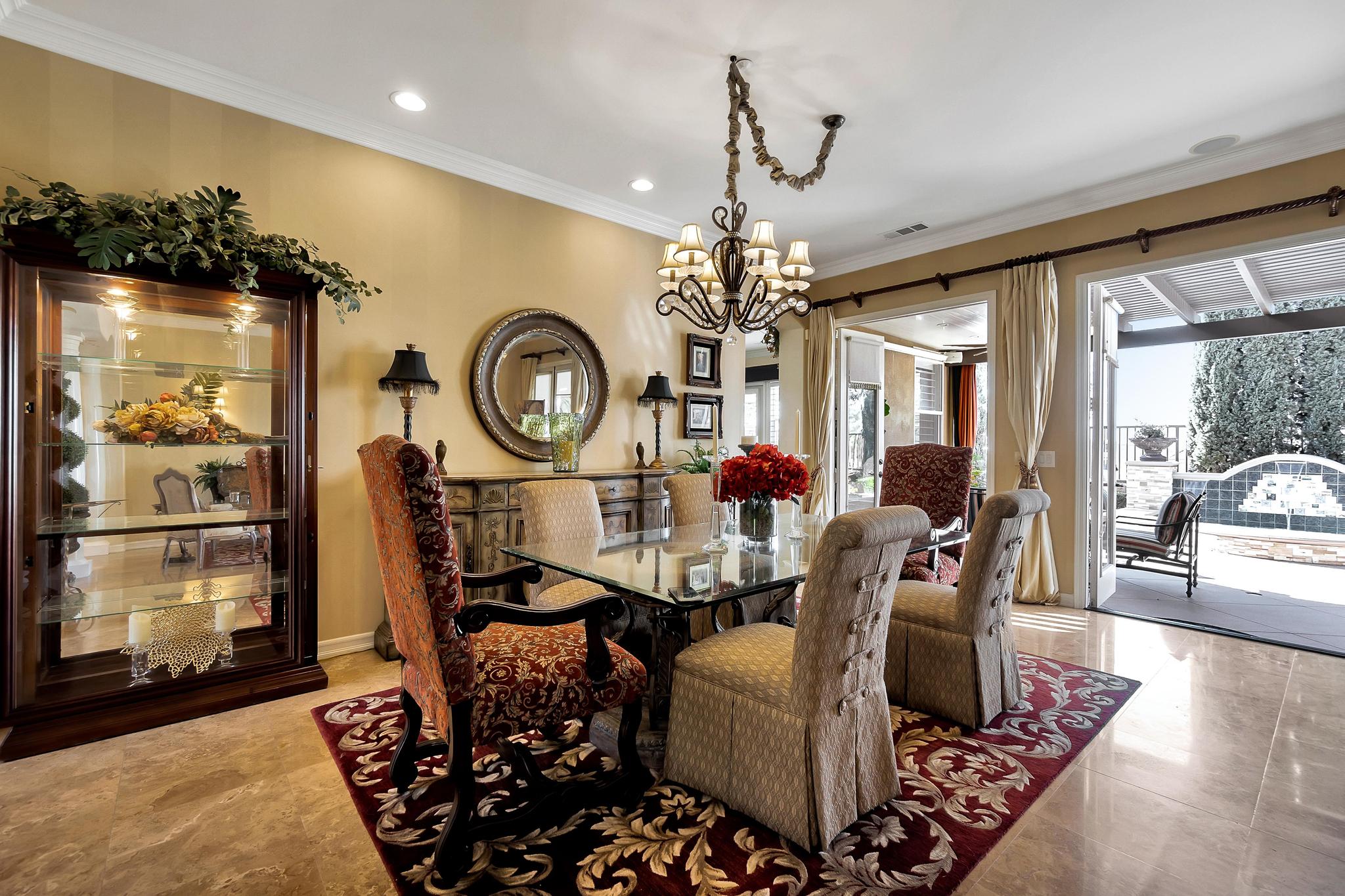 Tuscan-Inspired Olinda Ranch Villa – 467 Tangerine Place, Brea, CA 92823 - Dining Room with View of Pool
