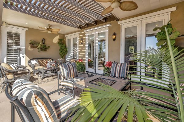 Tuscan-Inspired Olinda Ranch Villa – 467 Tangerine Place, Brea, CA 92823 - Angled View of Back Patio Furniture and Three French Doors
