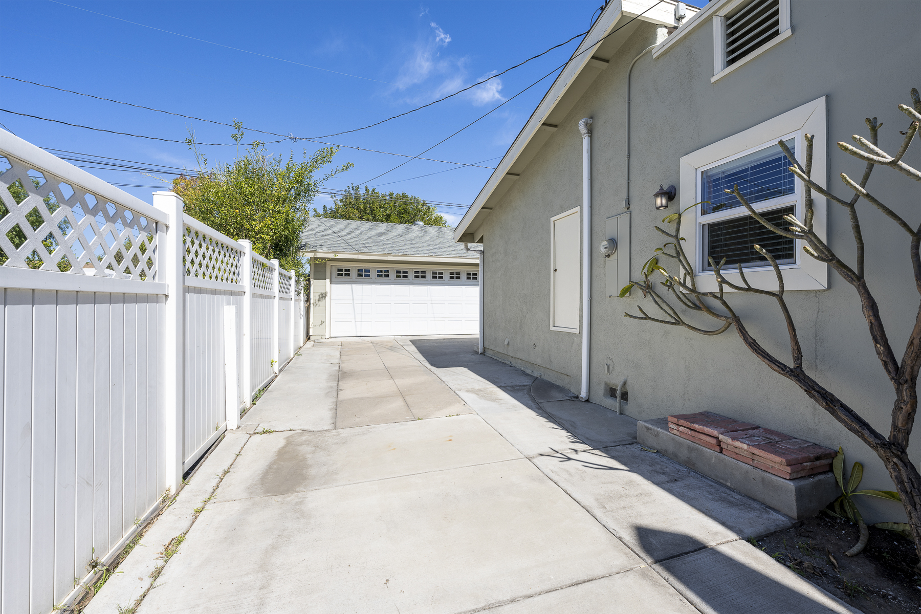 1229 Grove Place Fullerton CA 92831: Garage and side of home from driveway
