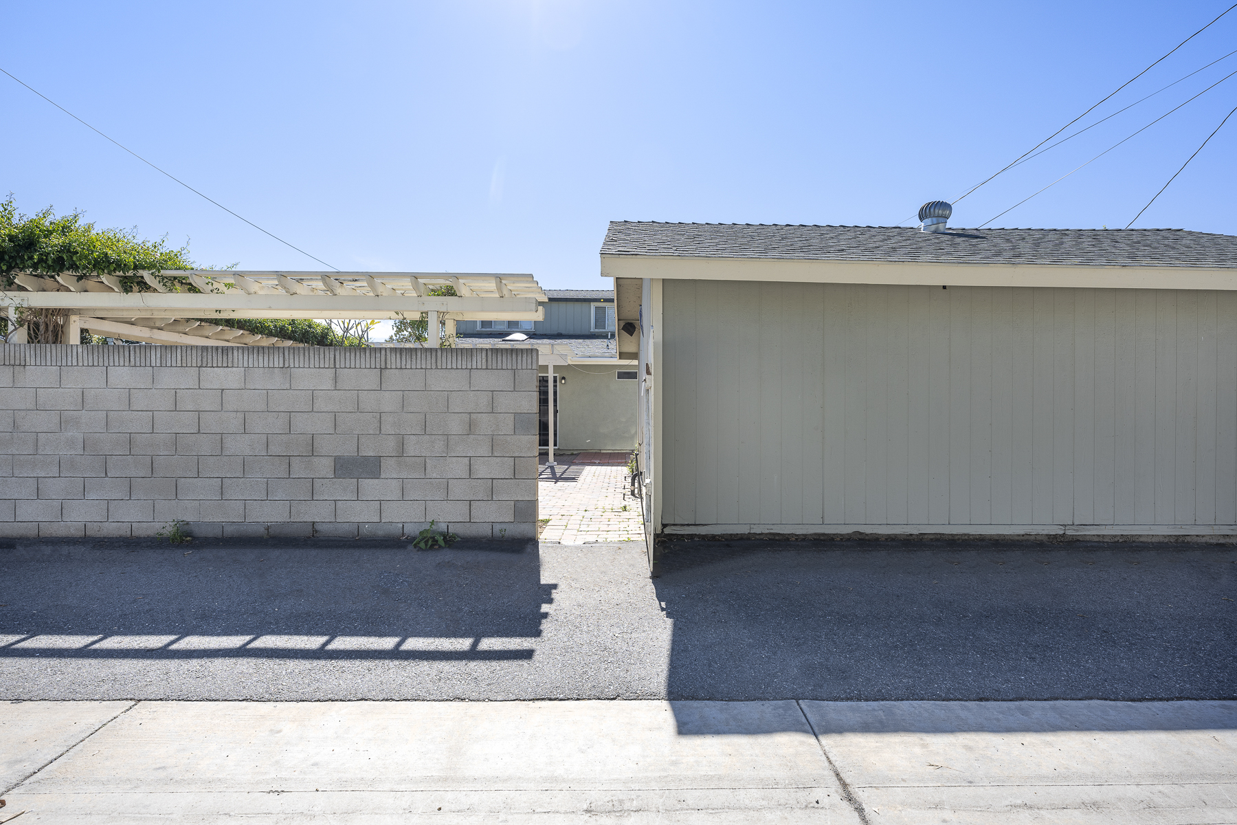 1229 Grove Place Fullerton CA 92831: Back of property from alley with gate open