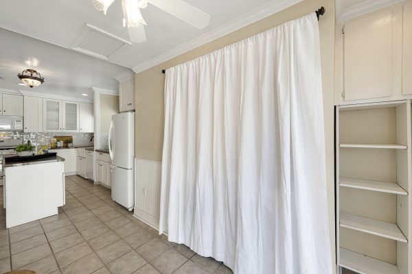 1229 Grove Place Fullerton CA 92831: Hallway looking into kitchen with curtain