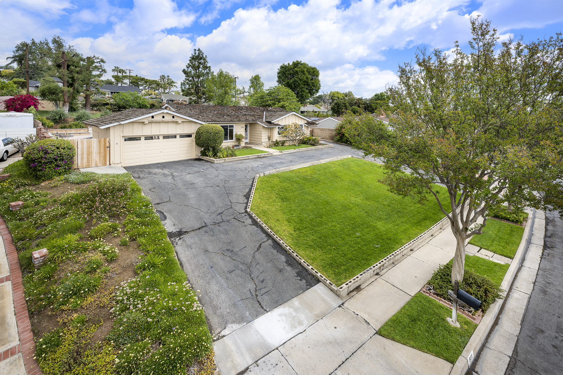 501 Dorothy Drive: Left aerial driveway shot with garage and left side yard in view