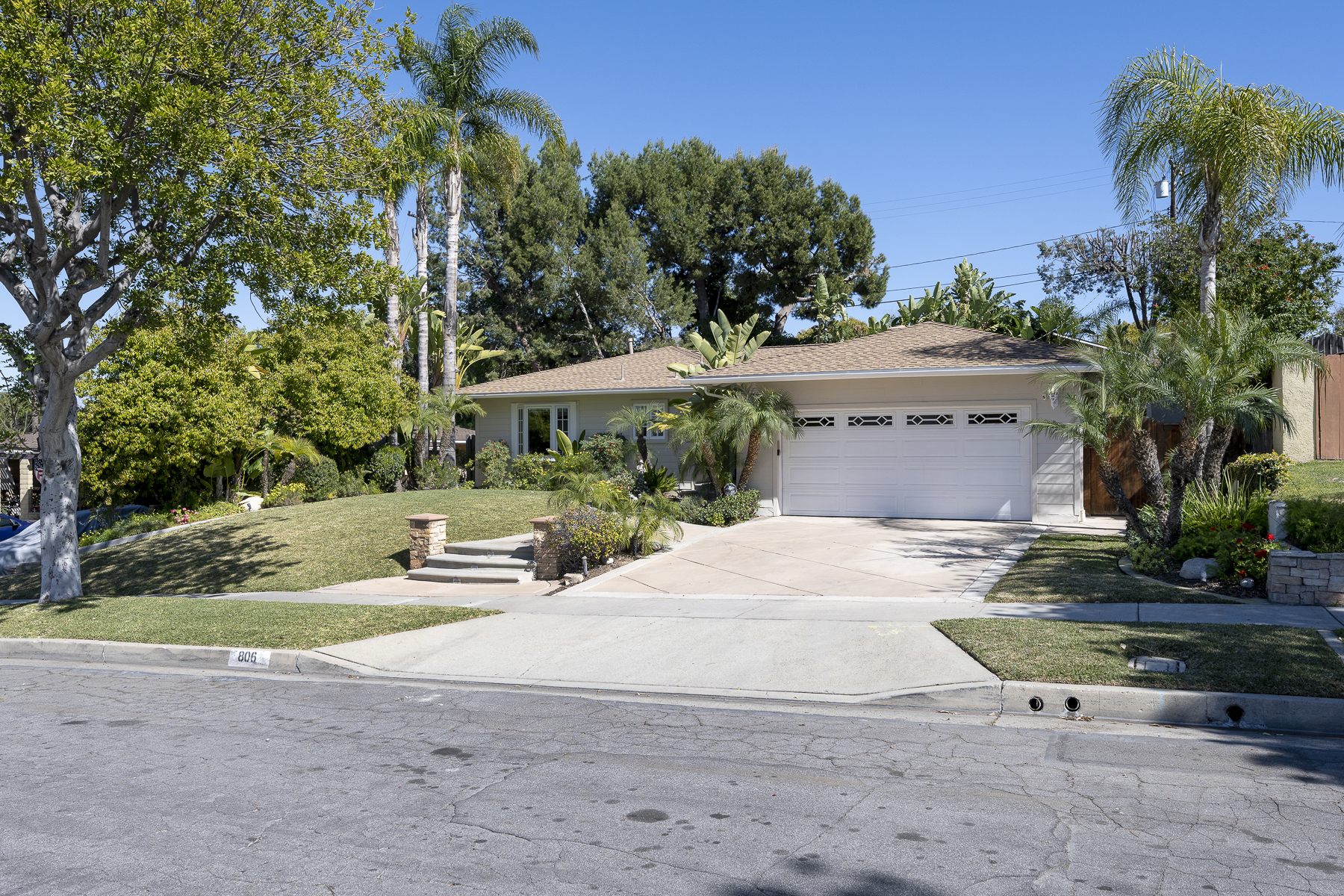 806 N. Adlena Drive, Fullerton, CA 92833: Exterior shot, driveway and garage wide street view.