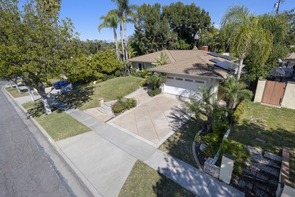 806 N. Adlena Drive, Fullerton, CA 92833: Aerial view of front of house, garage, driveway and yard.