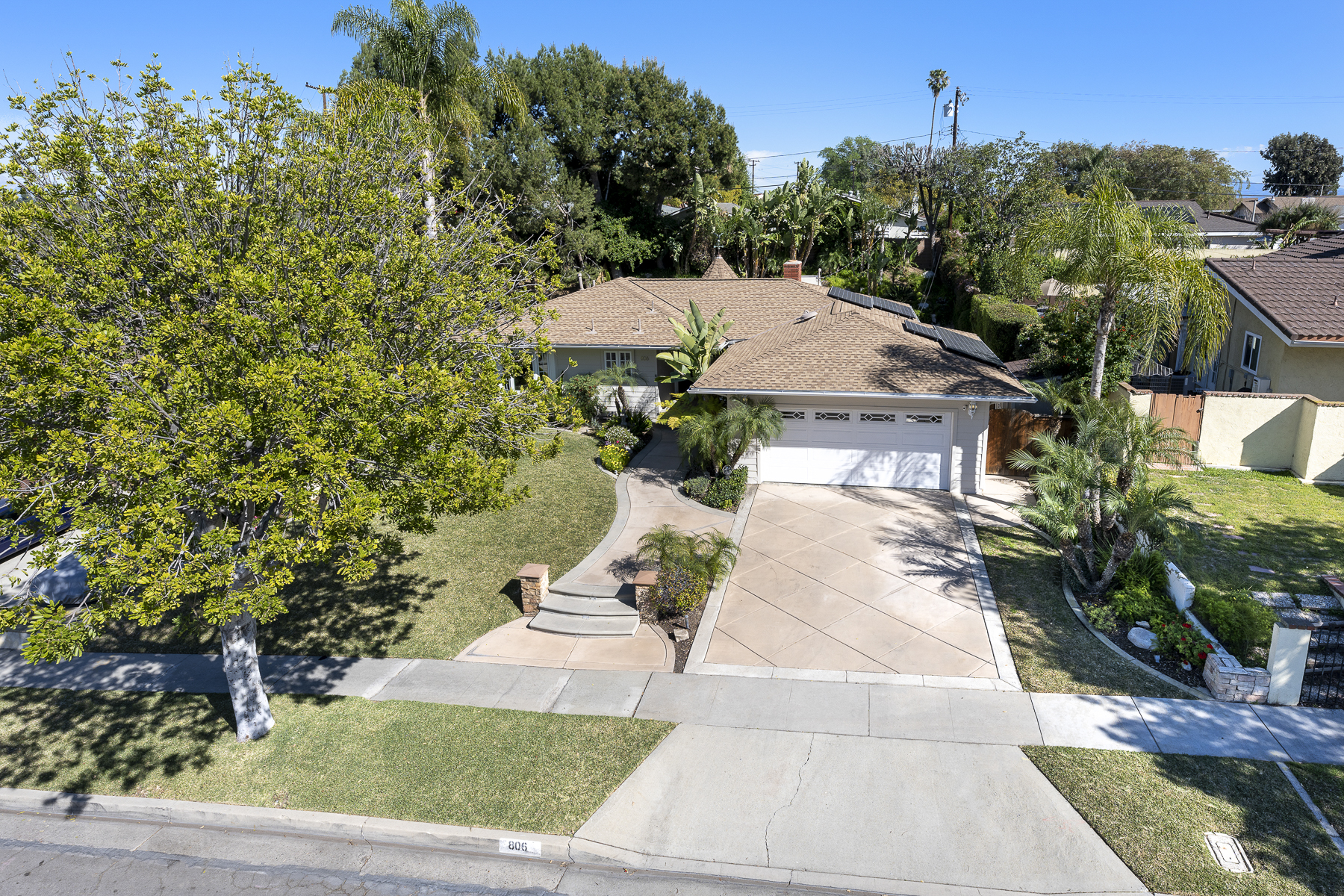 806 N. Adlena Drive, Fullerton, CA 92833: Aerial view of front of house, garage and driveway.