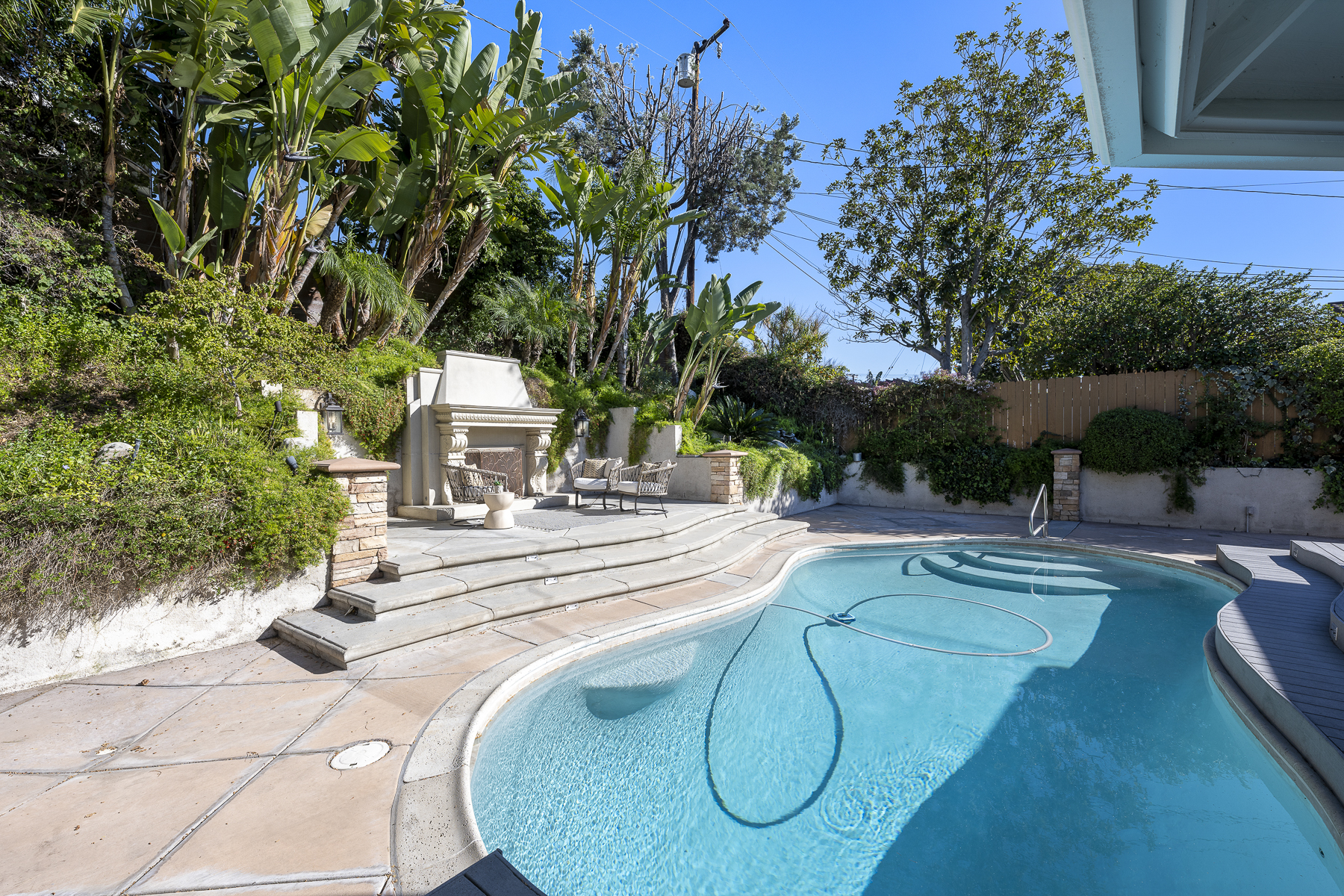 806 N. Adlena Drive, Fullerton, CA 92833: Exterior shot of pool and fireplace seating area.