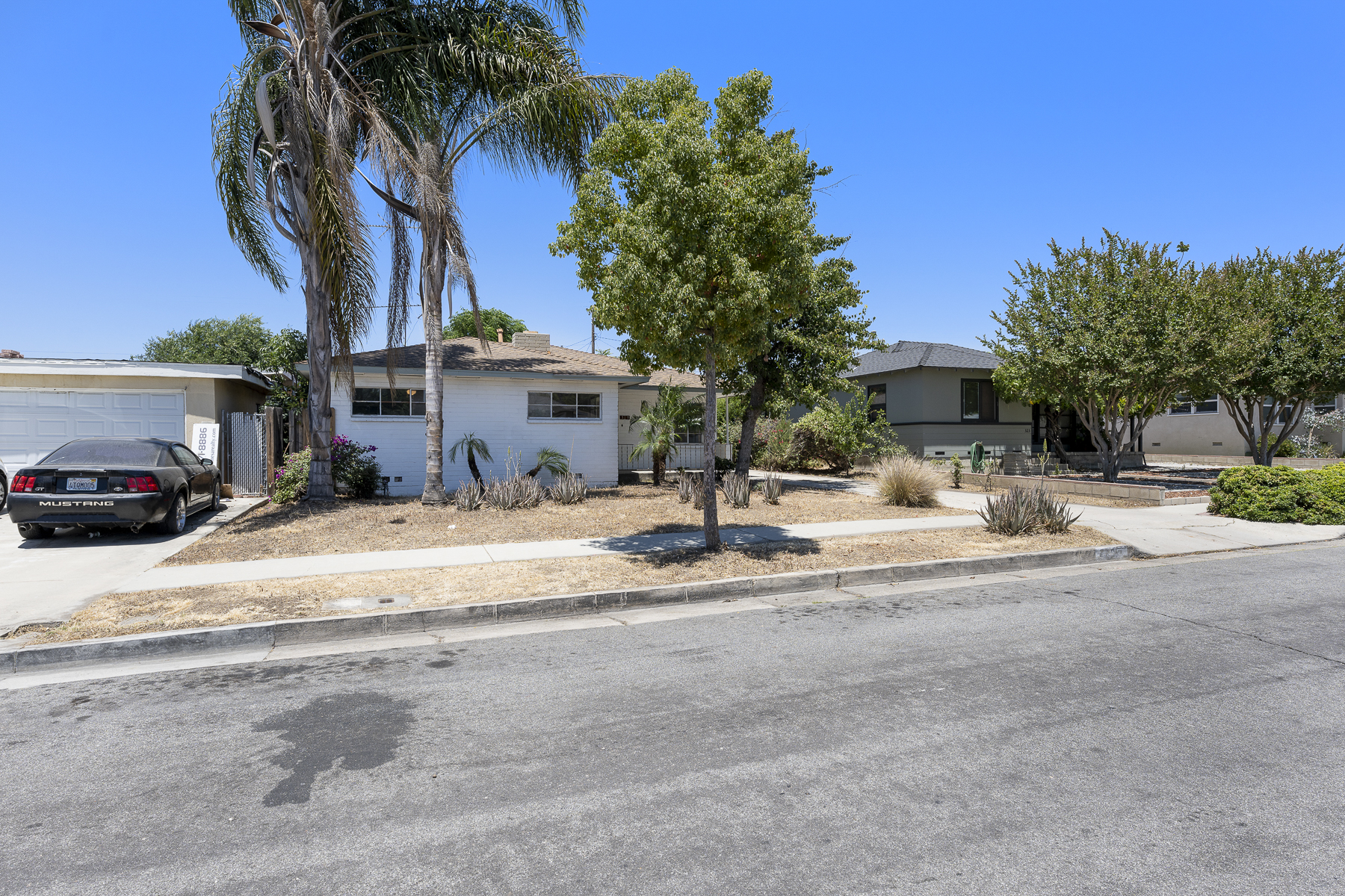 319 E. Francis Ave, La Habra, CA 90631: Exterior angled shot full front, wide street view.