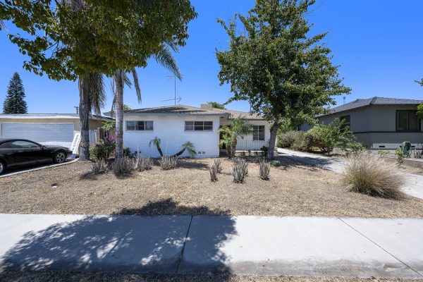 319 E. Francis Ave, La Habra, CA 90631: Exterior shot of front of house and yard.