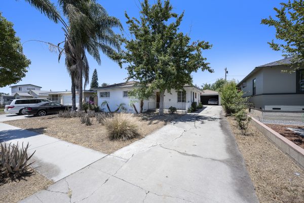 319 E. Francis Ave, La Habra, CA 90631: Exterior shot of front of house, full driveway.