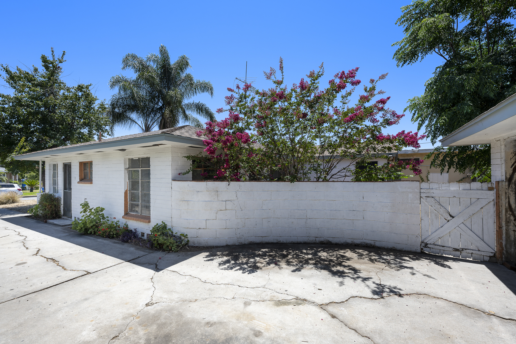 319 E. Francis Ave, La Habra, CA 90631: Exterior shot, front of house and gate.