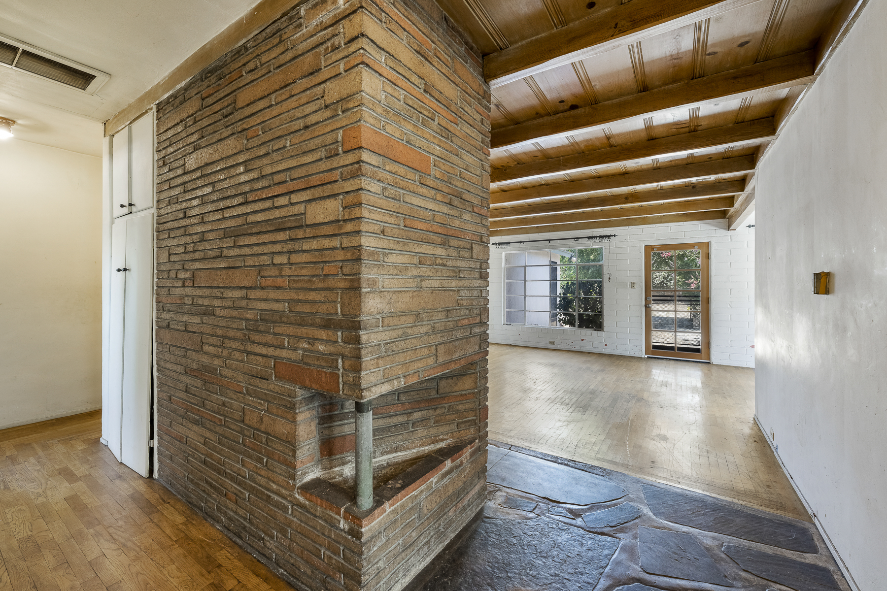 319 E. Francis Ave, La Habra, CA 90631: Interior shot, back of fireplace and living room.