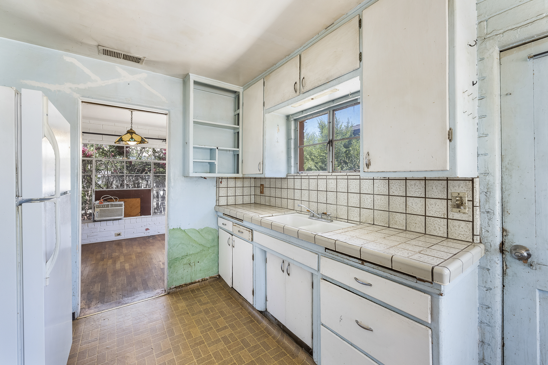 319 E. Francis Ave, La Habra, CA 90631: Interior kitchen sink and counter shot.