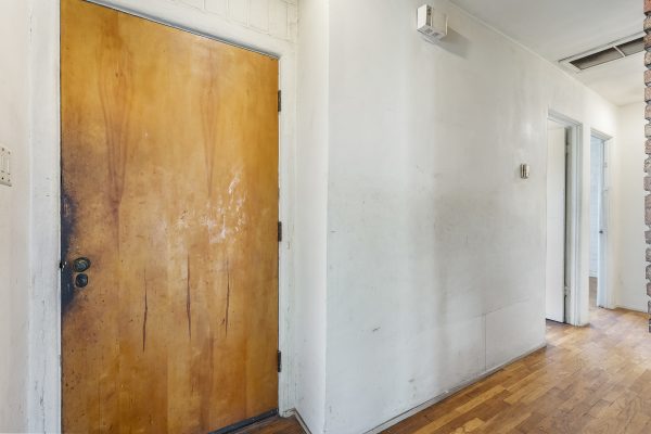 319 E. Francis Ave, La Habra, CA 90631: Interior hallway, wooden door shot.