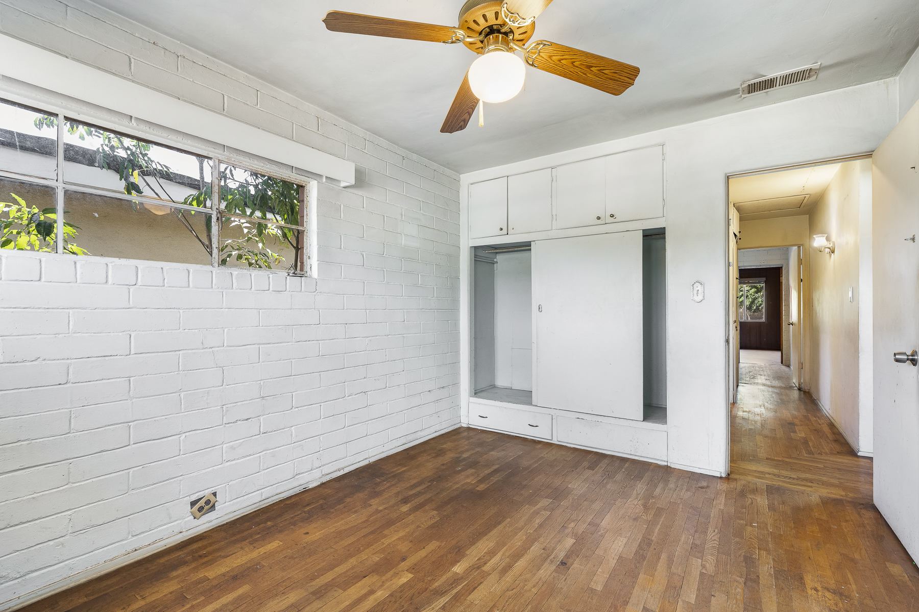319 E. Francis Ave, La Habra, CA 90631: Interior white brick room and hallway shot.