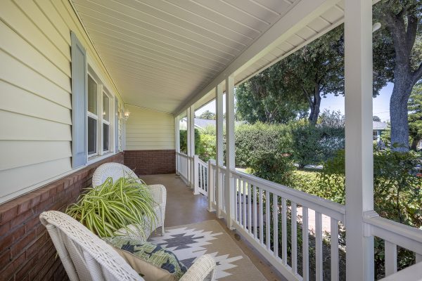 411 Truman Ave, Fullerton, CA 92832: Exterior view of front porch and railing.