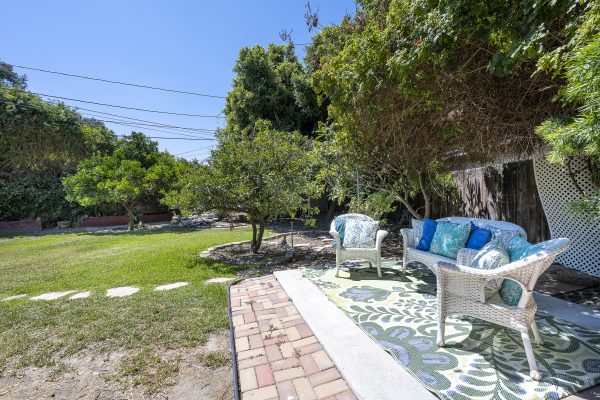 411 Truman Ave, Fullerton, CA 92832: Brick paver patio with outdoor furniture.