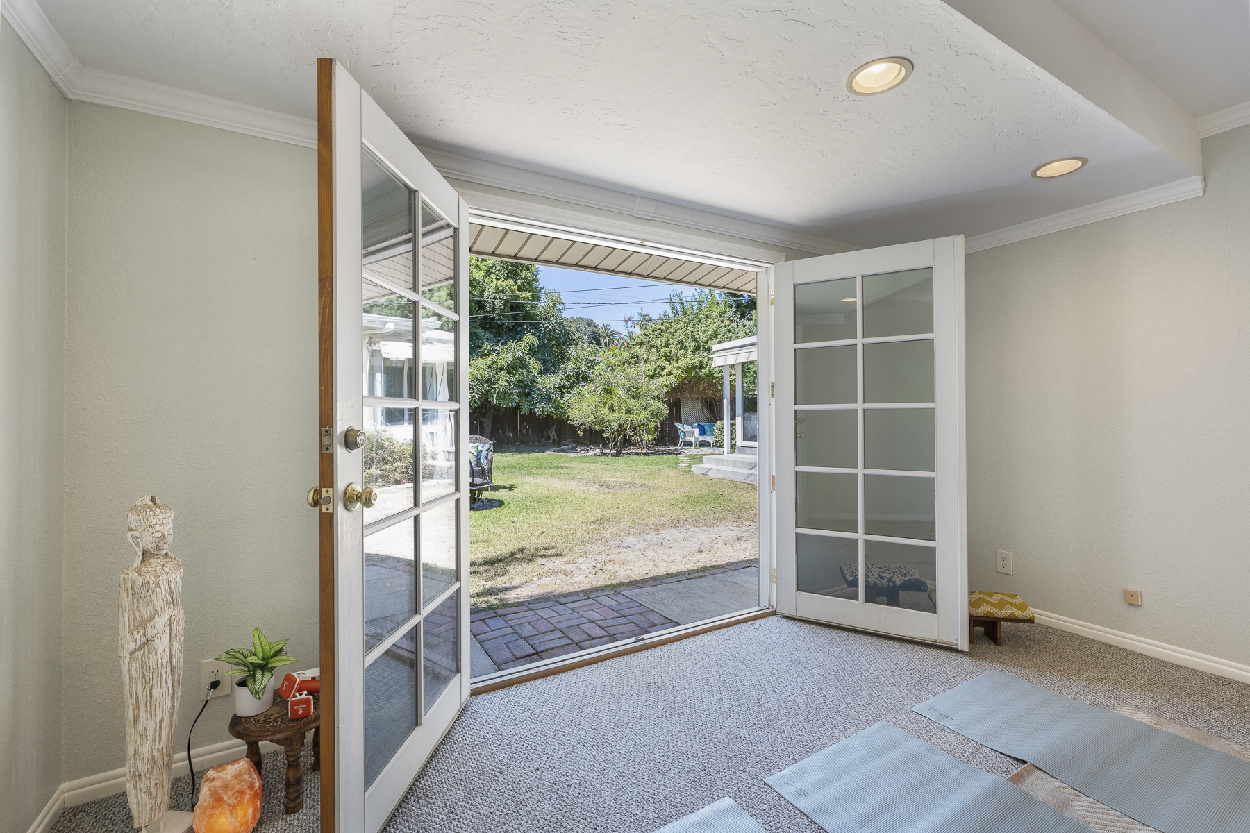 411 Truman Ave, Fullerton, CA 92832: Bedroom with exterior double door view.