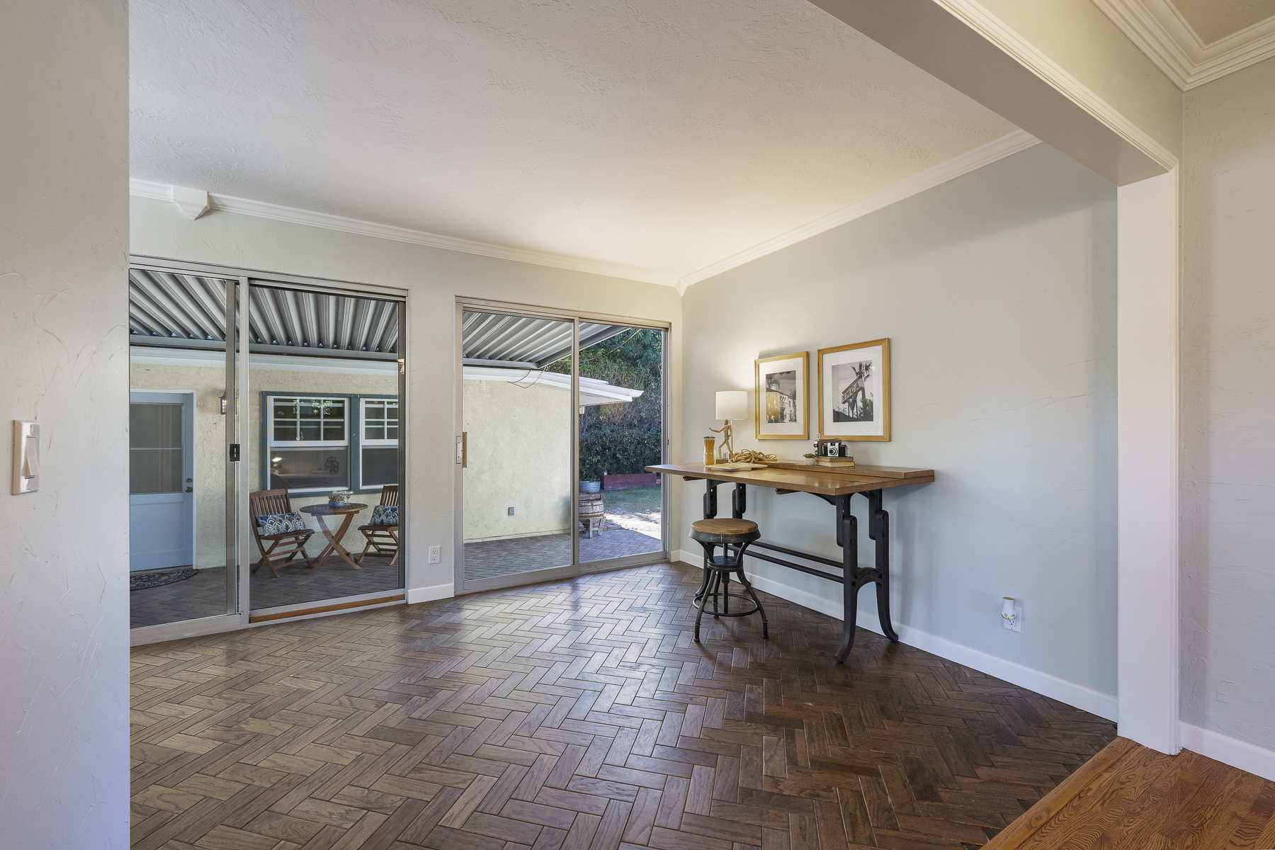 411 Truman Ave, Fullerton, CA 92832: Living space with hearing bone wood floors.