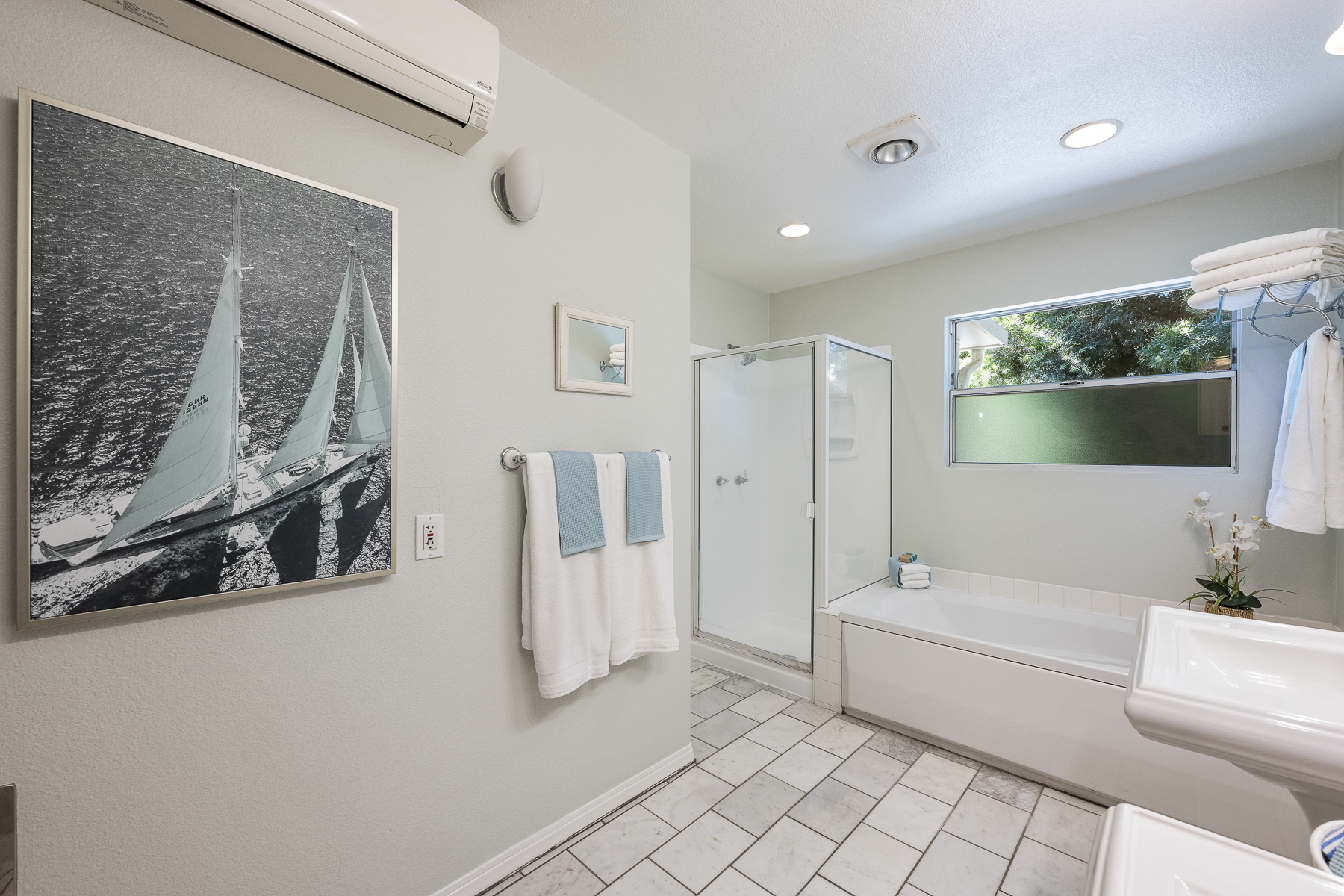 411 Truman Ave, Fullerton, CA 92832: Bathroom view with corner shower.