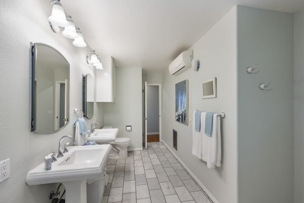 411 Truman Ave, Fullerton, CA 92832: Bathroom view of sinks and toilet.