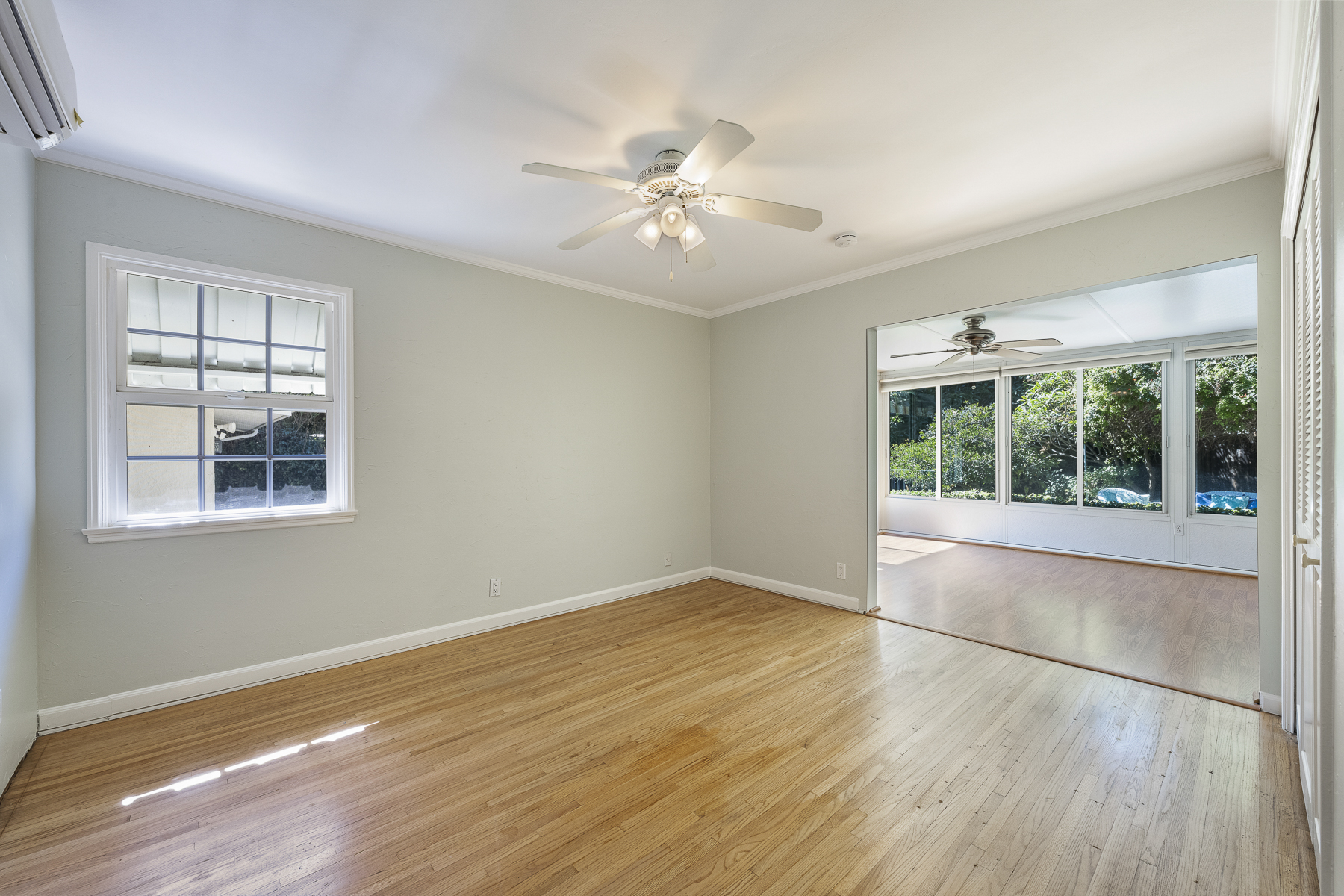 411 Truman Ave, Fullerton, CA 92832: Interior view of living space and glass window room.