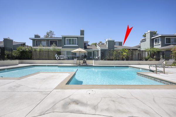 3424 Pinebrook Costa Mesa CA 92626: Picture of home with the arrow from angle by pool.