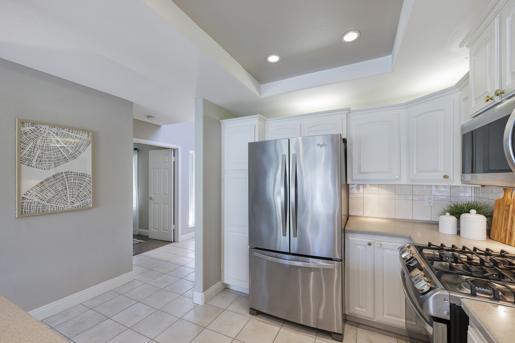3424 Pinebrook Costa Mesa CA 92626: Kitchen picture with hallway leading to kitchen.
