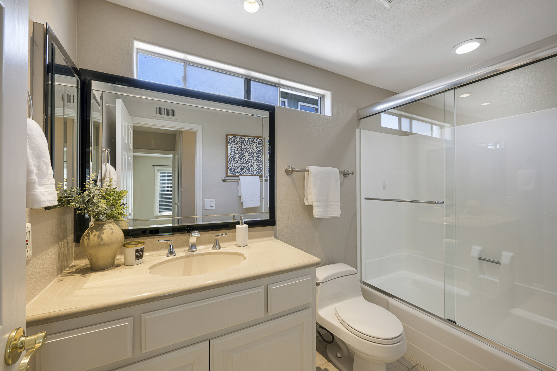3424 Pinebrook Costa Mesa CA 92626: Bathroom with black framed mirror.